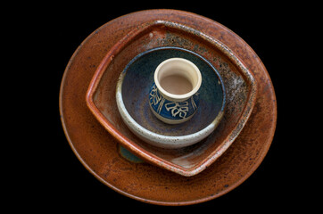 ceramic bowls against black