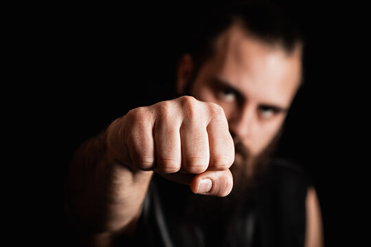 Biker holding a fist up to the camera