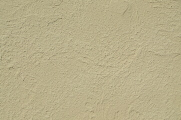 Beige background. The texture of the old plaster wall. Home decoration. Background for the image. Backgrounds for stories.