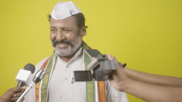 angry Indian politician avoiding news media while reporter asking questions about development - concept skipping press conference meetings.