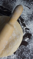 cooking process, modeling, recipe, dough, roll out with a wooden rolling pin, flour