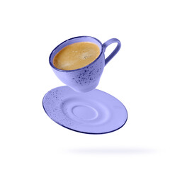 Violet vintage cup hot coffee and  saucer flying isolated on white background.