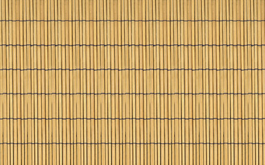 Wooden bamboo mat abstract background texture close-up.
