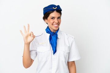 Airplane stewardess caucasian woman isolated on white background showing ok sign with fingers
