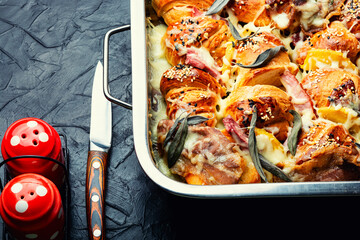 Croissants baked with cheese and meat.