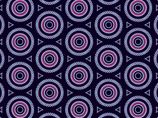 Hypnotic pink neon circle pattern on a black background.