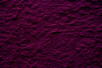 Crimson colored wall background with textures of different shades of crimson red