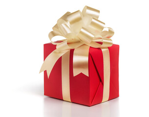 Gift box wrapped in a red paper with gold bow on a white background.