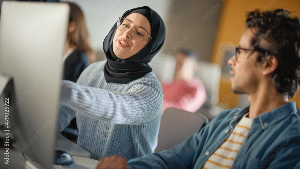 Aufkleber female muslim student wearing hijab, studying in modern university with diverse multiethnic classmat