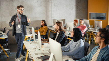 Teacher Giving Lesson to Diverse Multiethnic Group of Female and Male Students in College Room,...
