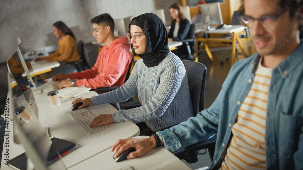 Poster diverse group of female and male students sitting in college room, learning computer science. young 