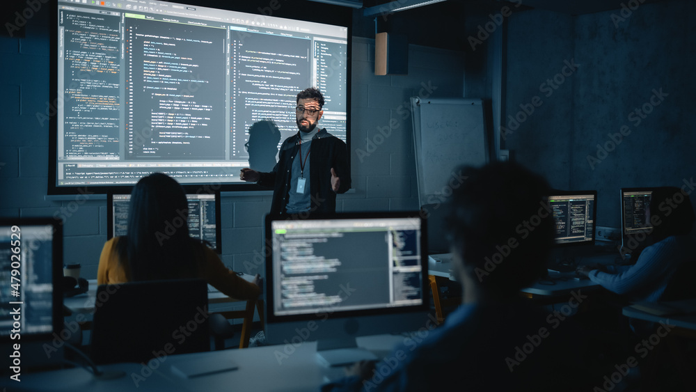 Aufkleber Teacher Giving Computer Science Lecture to Diverse Multiethnic Group of Female and Male Students in Dark College Room. Projecting Slideshow with Programming Code. Explaining Information Technology.