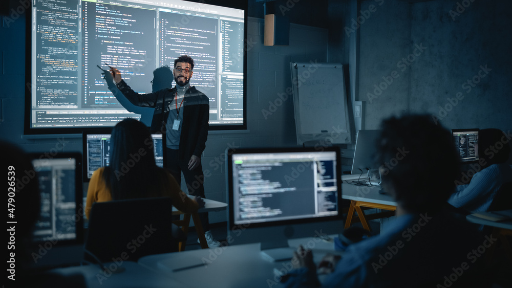 Poster Teacher Giving Computer Science Lecture to Diverse Multiethnic Group of Female and Male Students in Dark College Room. Projecting Slideshow with Programming Code. Explaining Information Technology.