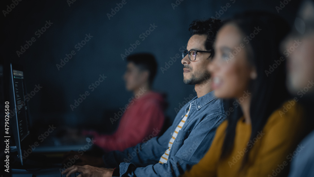 Poster diverse multiethnic group of female and male students sitting in college room, collaborating on scho