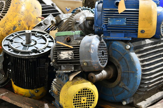 Warehouse for old broken and unused AC and AC motors in an electrical workshop.
