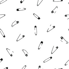 Safety pins black and white vector seamless pattern.