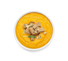 Bowl of tasty pumpkin cream soup on white background