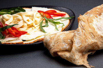 assorted Caucasian cheese with sauce, lavash and herbs