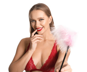 Attractive woman with feather stick from sex shop on white background