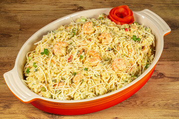 Shrimp Risotto dish with chives and Parmesan cheese.