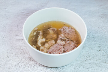 Galbitang, Korean style beef Short Rib Soup : Beef ribs, soaked in cold water to remove the blood, and white radish chunks simmered together until tender. The clear stock is rich and savory, and the t