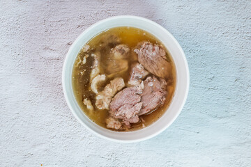 Galbitang, Korean style beef Short Rib Soup : Beef ribs, soaked in cold water to remove the blood, and white radish chunks simmered together until tender. The clear stock is rich and savory, and the t