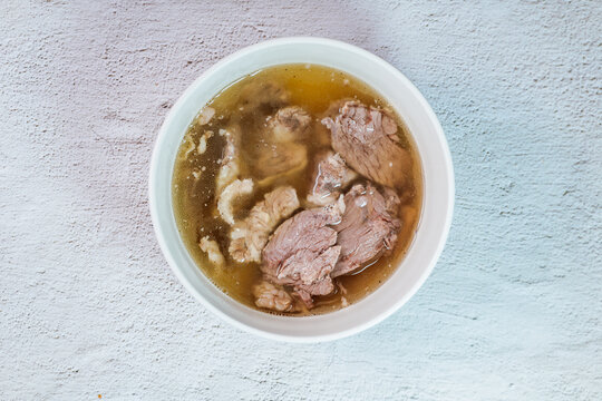 Galbitang, Korean style beef Short Rib Soup : Beef ribs, soaked in cold water to remove the blood, and white radish chunks simmered together until tender. The clear stock is rich and savory, and the t