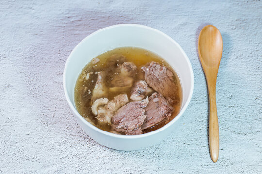 Galbitang, Korean style beef Short Rib Soup : Beef ribs, soaked in cold water to remove the blood, and white radish chunks simmered together until tender. The clear stock is rich and savory, and the t
