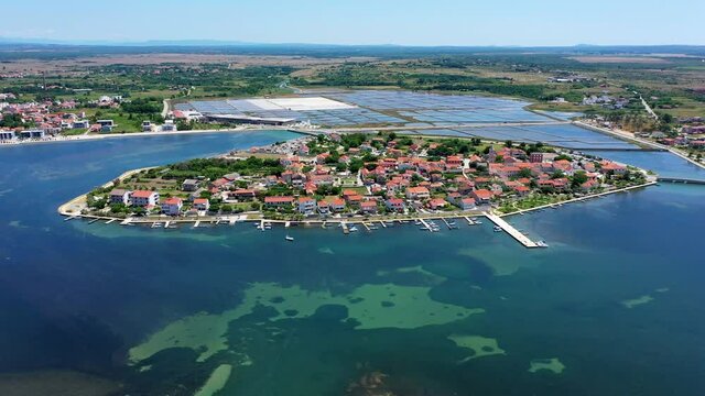 Historic town of Nin laguna aerial view with Velebit mountain background, Dalmatia region of Croatia. Aerial view of the famous Nin lagoon and medieval in Croatia