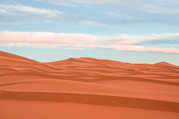 Plakat Beautiful view of sand dunes in sahara desert against cloudy sky, Sand dunes with waves pattern in desert