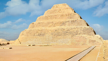 Memphis, Egypt - January 4, 2022 : The oldest standing step pyramid in Egypt, designed by Imhotep...