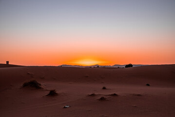 Fototapeta na wymiar Beautiful view of sand dunes in sahara desert during dusk, Sunset over sand dunes in desert landscape