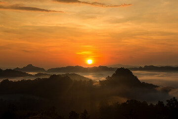 Twilight sky background. Colorful Sunset sky and cloud. Evening sky over the mountain. Dramatic sunset over the mountain.