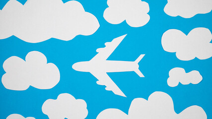 Paper plane on a blue background with paper clouds.