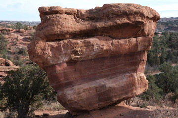Balanced Rock formation inside red rocks tourist attraction Colorado National Park Garden of the...