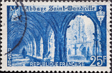 France - circa 1951: A postage stamp from France showing the Abbey of Saint Wandrille