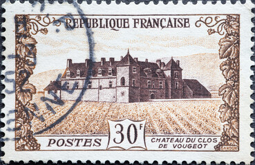 France - circa 1951: A postage stamp from France showing the historic Castle Clos du Vougeot