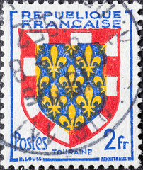 France - circa 1951: A post stamp from France showing the symbol of the Provincial Arms- Touraine