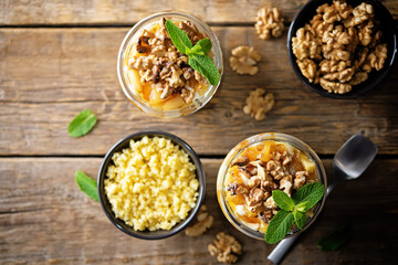 Greek yogurt millet caramelized apple walnuts parfait in a glass