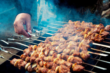 meat kebab on the grill. traditional picnic outdoor barbecue. barbecue grilled meat. High quality photo