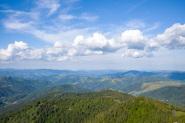 Naklejka premium Clouds over the Ardeche countryside in Europe, France, Ardeche, in summer, on a sunny day.