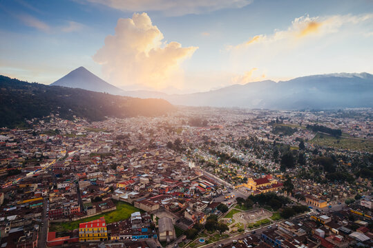 Xela Quetzaltenango, Guatemala During Golden Hour Sunset with Volcano Santa Maria in the Background. 