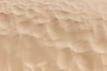 Coastal undulating sand. Neutral background