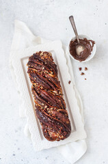 Chocolate yeast cake babka with pecans