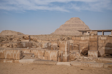 View to Step pyramid of Djoser in Saqqara from pyramid of Unas, an archeological remain in the Saqqara necropolis, Egypt
