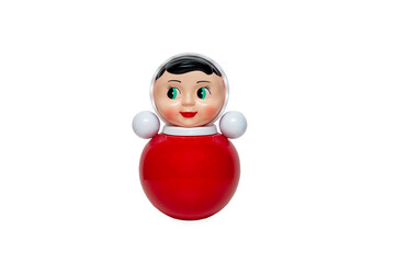 Bright red roly-poly toy on the white. Front view of russian tilting doll isolated on white.