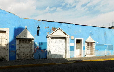 A street in a tipical mexican town, with coloured houses
