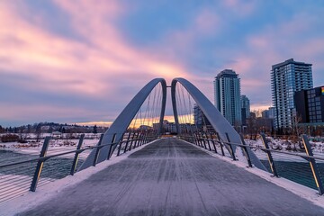 Sunrise Clouds Over A Downtown Calgary Bridge