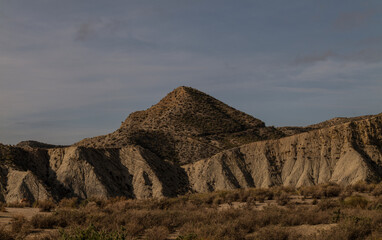 Landscape of Tabernas Desert, Almeria, Spain, against cloudy sky