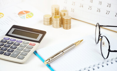 calculator, pen, notebook and business report, business idea	                        